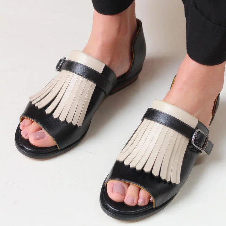 Lucrezia | Elegante sandaler med plateau og moderne frynser.